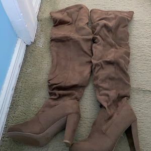 High knee brown boots with heels